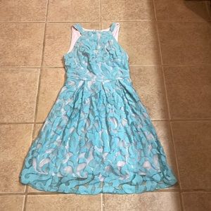 Beautiful ladies Coconnino dress Lining is a soft pink outer is lace blue.